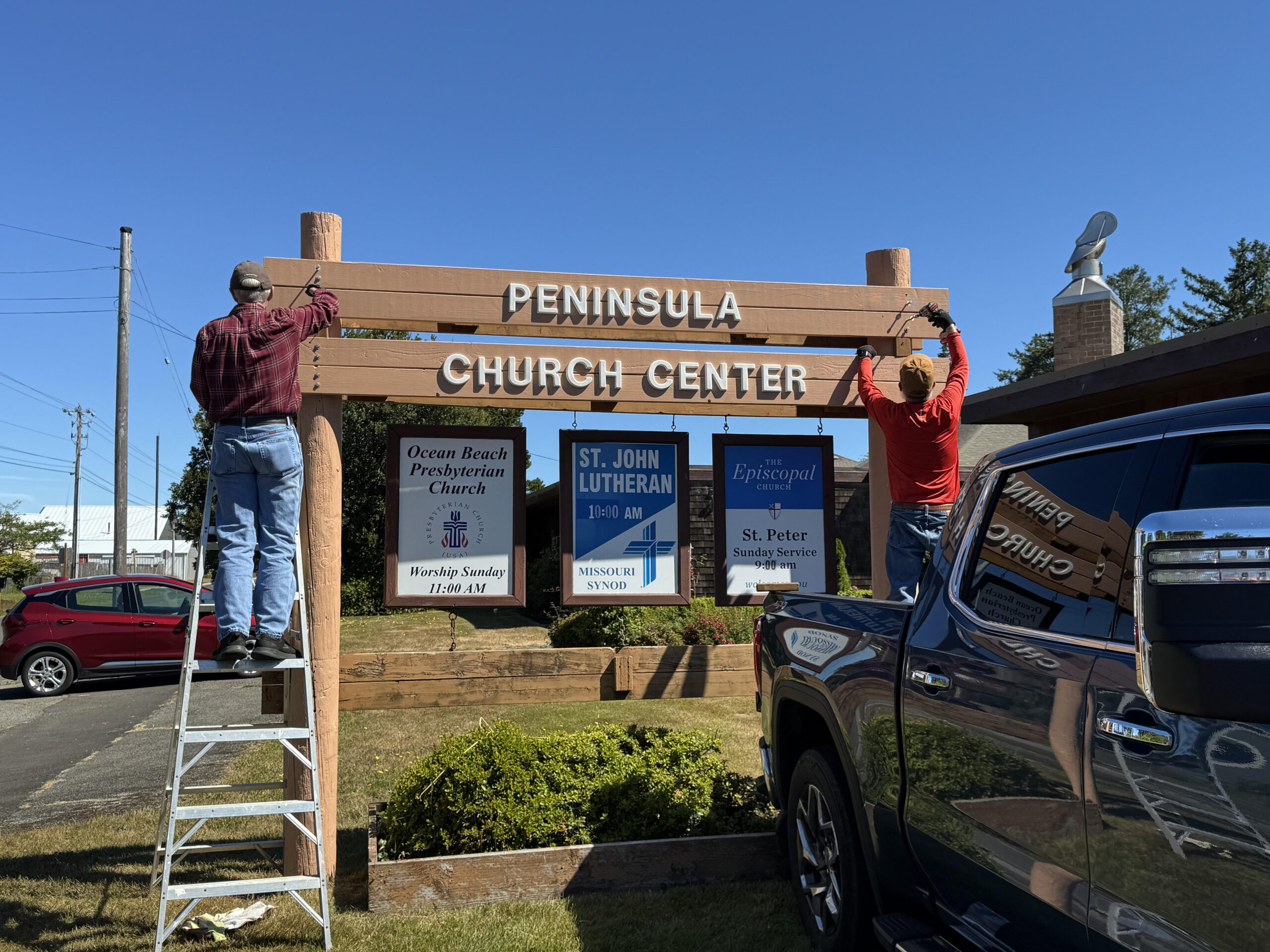 Jamie & Rob Restoring the Sign